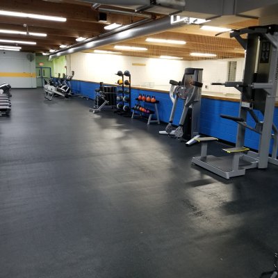 view of different gym machines